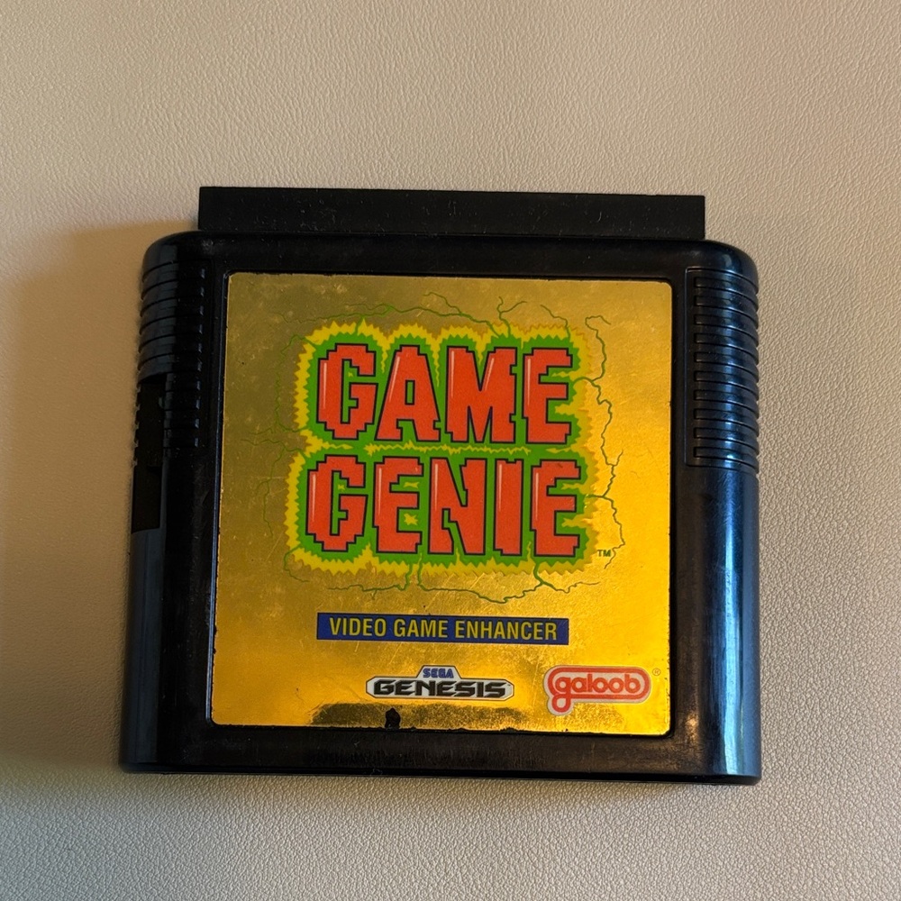 Galoob Game Genie for Sega Genesis - Black and Gold